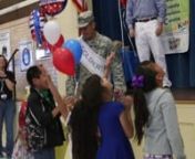 Hughey Elementary School student Naihommy Rivera gets a surprise visit from her father, Luis Rivera, who has been deployed for the last six months during an awards ceremony at the school on April 30.