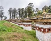 The Dochula Pass is a mountain pass in the snow covered Himalayas within Bhutan on the road from Thimpu to Punakha where 108 memorial chortens or stupas known as