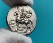 AR Didrachm, 6.54g (20mm, 9h). ΞΕ-ΝΟΚΡΑ/Τ-ΗΣ (Xenkrates). Armored cavalryman, riding horse l., raising his r. hand in salute and turning his bearded and laureate head to face the viewer; in upper r., monogram and pileus / ΤΑΡΑΣ Phalanthos, nude, riding dolphin l., his body turned slightly back to r., holding a trident over his r. shoulder in his r. hand and holding drapery in his upraised l., monogram of ΣΩ; below, waves and cuttlefish. nnReferences: HN III, 1058. SNG ANS 1258.