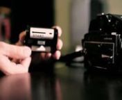This video shows the method of loading a roll of 120 film into a Mamiya M645 1000S camera. nnThis movie was shot from a single camera angle using a Canon 7D and a Sigma 30MM lens. The settings were, ISO 1250, a Shutter Speed of 1/50s, and an aperture of 1.6. I transcoded the video to ProRes 422 before manipulating it which made the process much smoother.nnThis is the first time I use Final Cut Studio to edit a video. I used color for the grading, motion for the opening title and FCP to put it al