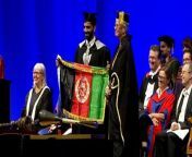 Credit: SWNS / Naimat Zafary&#60;br/&#62;&#60;br/&#62;A refugee who fled the Taliban in Afghanistan on a plane with just a backpack has graduated a UK university with a master’s degree.&#60;br/&#62;&#60;br/&#62;Naimat Zafary, 37, graduated from Sussex University with a merit in Governance, Development and Public Policy this week.&#60;br/&#62;&#60;br/&#62;He was forced to flee his home in Kabul, Afghanistan, when the Taliban took over in August 2021. &#60;br/&#62;&#60;br/&#62;Naimat was evacuated by British troops with his wife, Saima, 30, and four children in August 2021.&#60;br/&#62;&#60;br/&#62;The family took just a backpack each - containing food, water and a change of clothes.&#60;br/&#62;&#60;br/&#62;After spending four months in a hotel in London, the Home Office arranged a permanent move to Hove, East Sussex, in December 2021.&#60;br/&#62;&#60;br/&#62;Naimat says his family received a &#92;