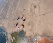 This group of skydivers attempted a fantastic trick in Namibia. After jumping from their airplane, they grabbed their hands to form a circle and seamlessly flew toward the colorful salt flats below.