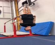 This guy showcased some remarkable skills and strength with a handstand trick. After he hung himself upside down on parallel bars, he hopped and landed on the floor in a handstand position.