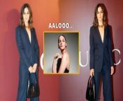 Ace actress Alia Bhatt arrives for the grand Gucci store launch in Mumbai. The Highway girl gears a black coloured bomb attire for the event, don&#39;t miss Alia&#39;s cute reaction on being called &#39;Aalooo&#39; by a pap.