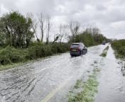 Cars wade through flooded Sussex roads following Storm KathleenPA