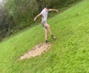 This guy was with his friends when he decided to jump into a puddle. As he jumped, he slipped and fell into it, making his friends laugh out loud. He, then, quickly stood up, frustrated, and showed his mud-covered back on his friend&#39;s request.