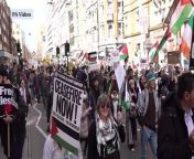 People take part in a pro-Palestine march in central London during a national demonstration for ceasefire in Gaza.