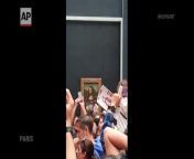 A man seemingly disguised as an old woman in a wheelchair threw a piece of cake at the glass protecting the Mona Lisa on Sunday at the Louvre Museum and shouted at people to think of planet Earth. The cake attack left a conspicuous white creamy smear on the glass but the famous work by Leonardo da Vinci was unharmed.&#60;br/&#62;