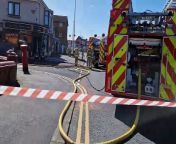Emergency crews deal with a fire at a tanning salon on Caunce Street in Blackpool.
