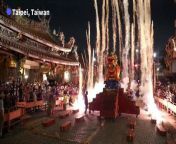 Hundreds of devotees gather to watch a fireworks show with a burning &#92;