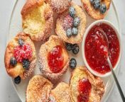 We love our classic skillet Dutch baby recipe, but we love these shareable mini versions, topped with fresh fruit and jam.